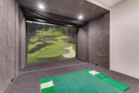 a living room with furniture windows and a flat screen tv