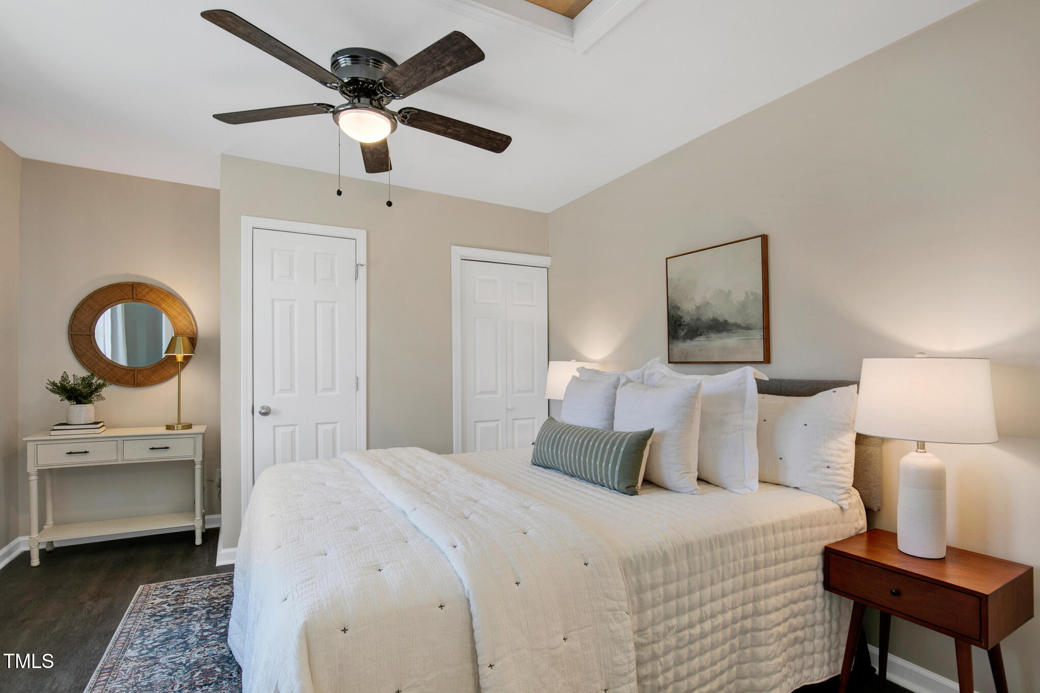 302 St Augustine Raleigh, NC 27610 - Photo 11 of 27 a bedroom with a bed and a table