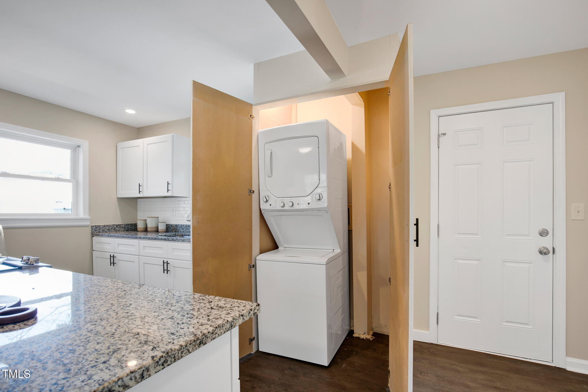 302 St Augustine Raleigh, NC 27610 - Photo 19 of 27 a kitchen with a sink and wooden floor