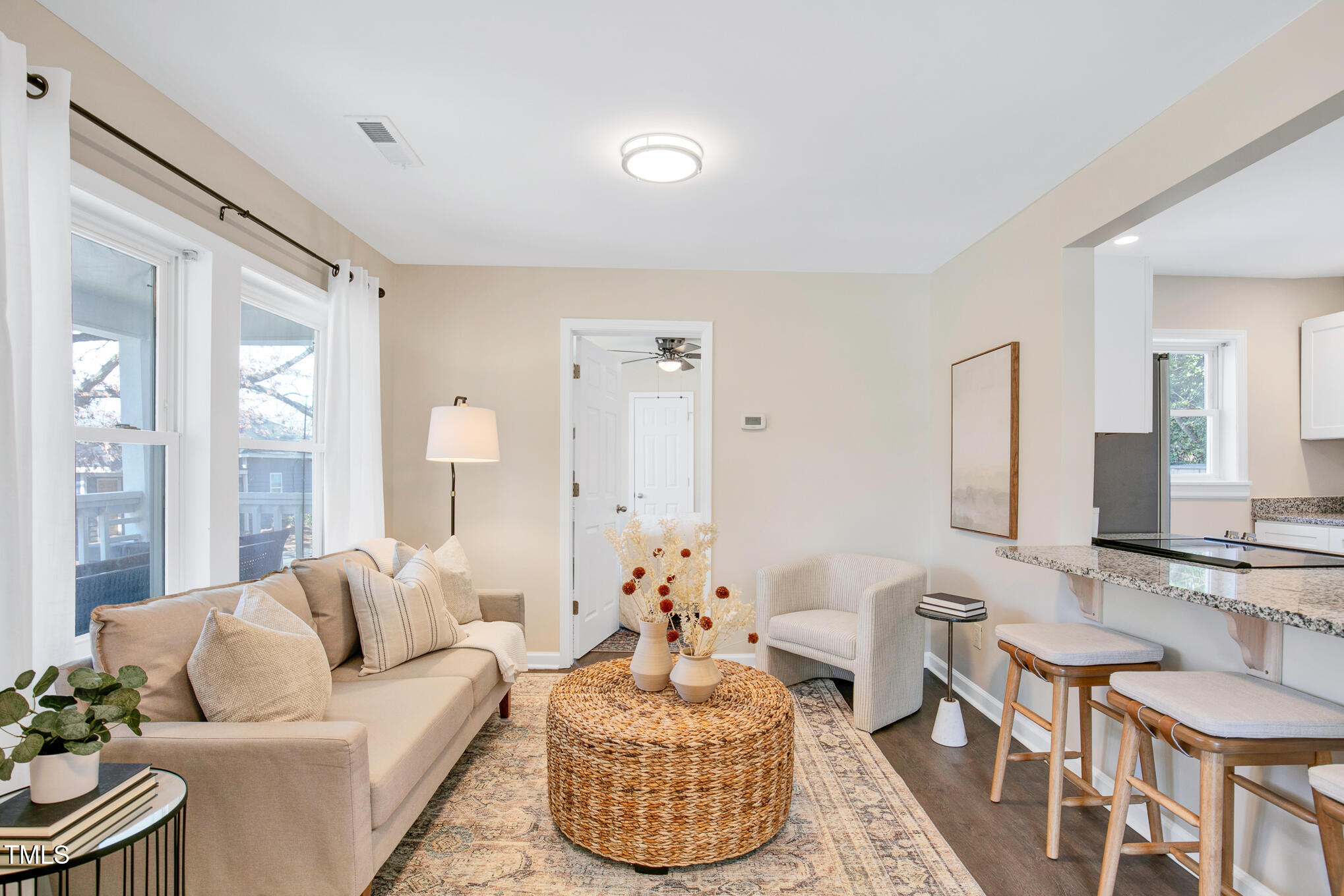 302 St Augustine Raleigh, NC 27610 - Photo 5 of 27 a living room with furniture and a large window