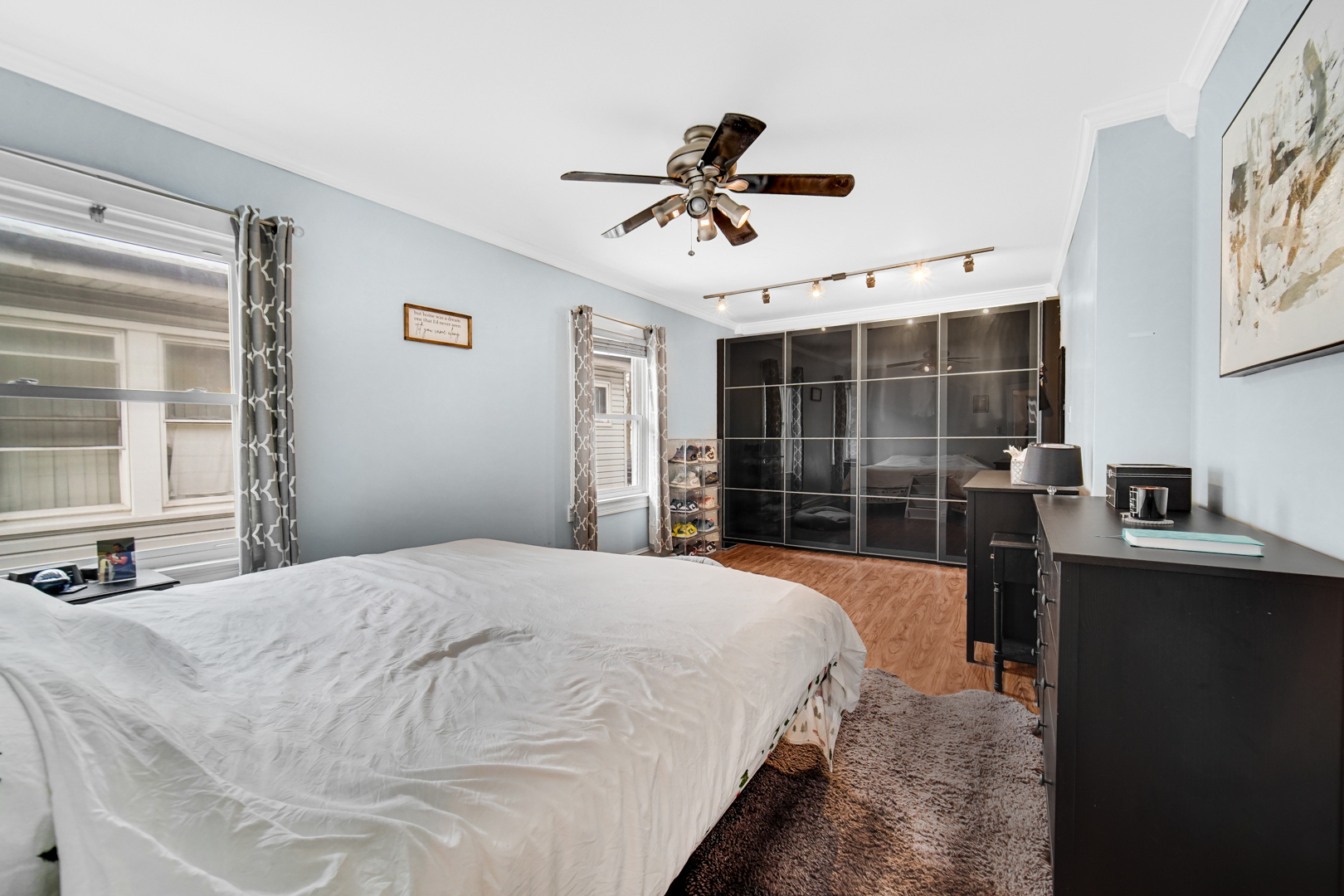 5531 West Grace Street Chicago, IL 60641 - Photo 14 of 22 a bedroom with a bed and a window