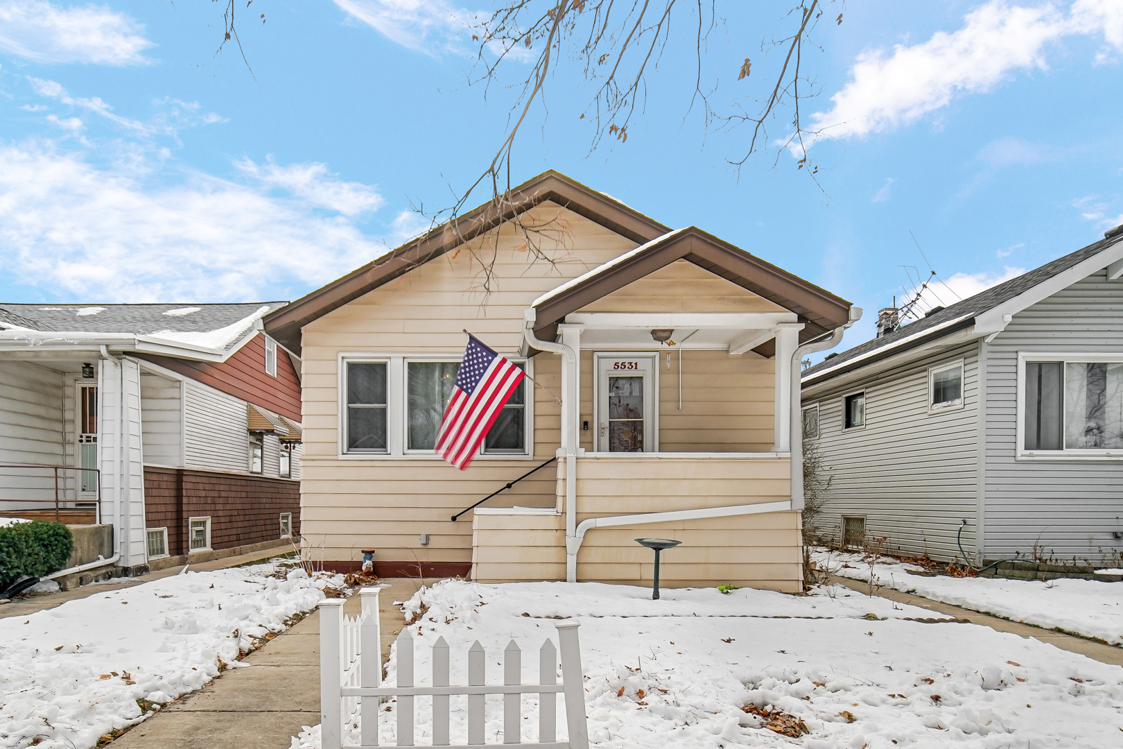 5531 West Grace Street Chicago, IL 60641 - Photo 2 of 22 a view of a house with a yard