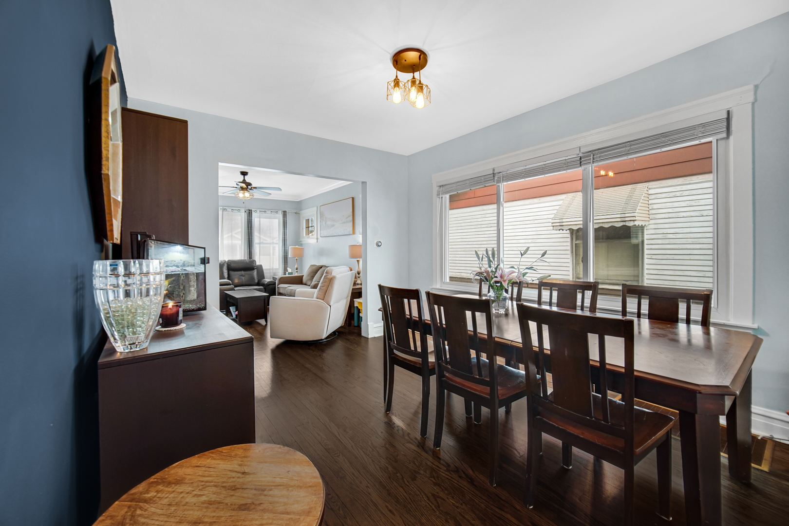 5531 West Grace Street Chicago, IL 60641 - Photo 10 of 22 a living room with furniture a rug and a large window