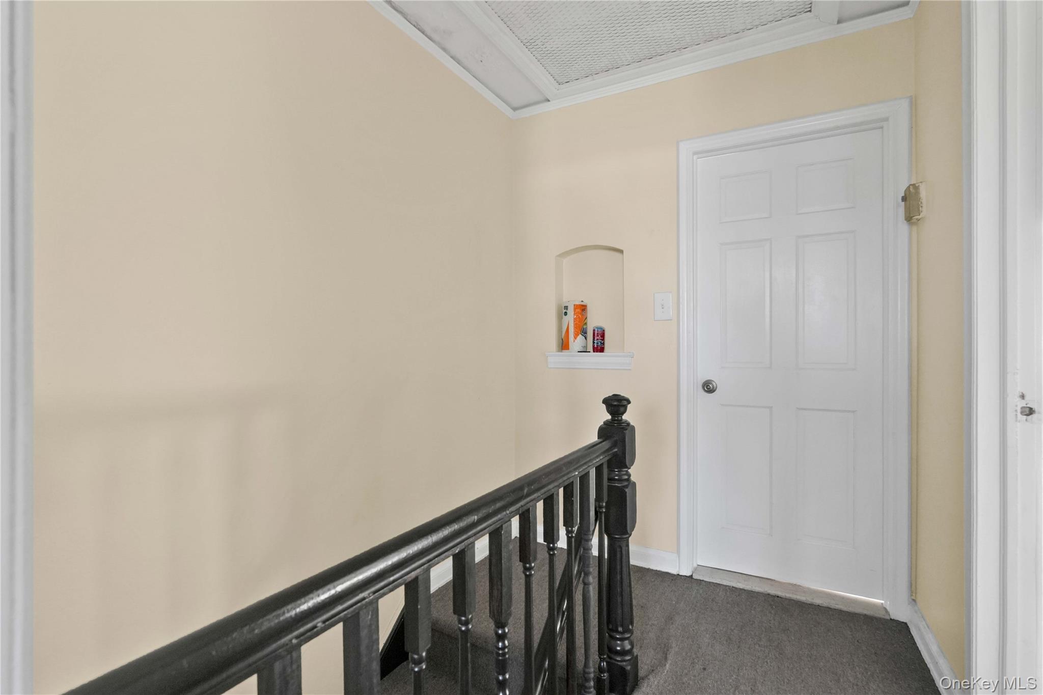 136-76 71st Road Queens, NY 11367 - Photo 16 of 31 a view of a hallway with wooden floor