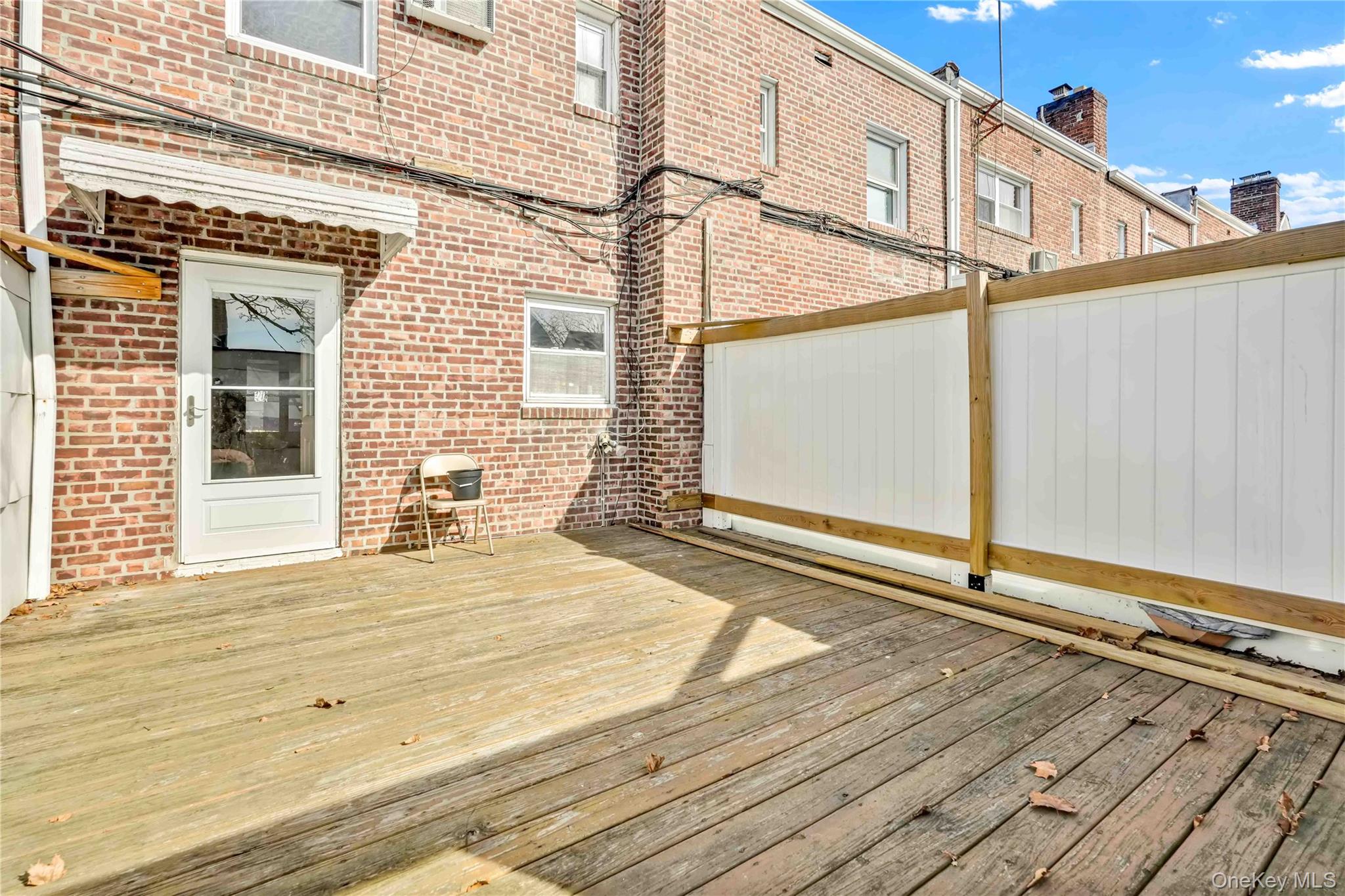 136-76 71st Road Queens, NY 11367 - Photo 22 of 31 a view of a house with street