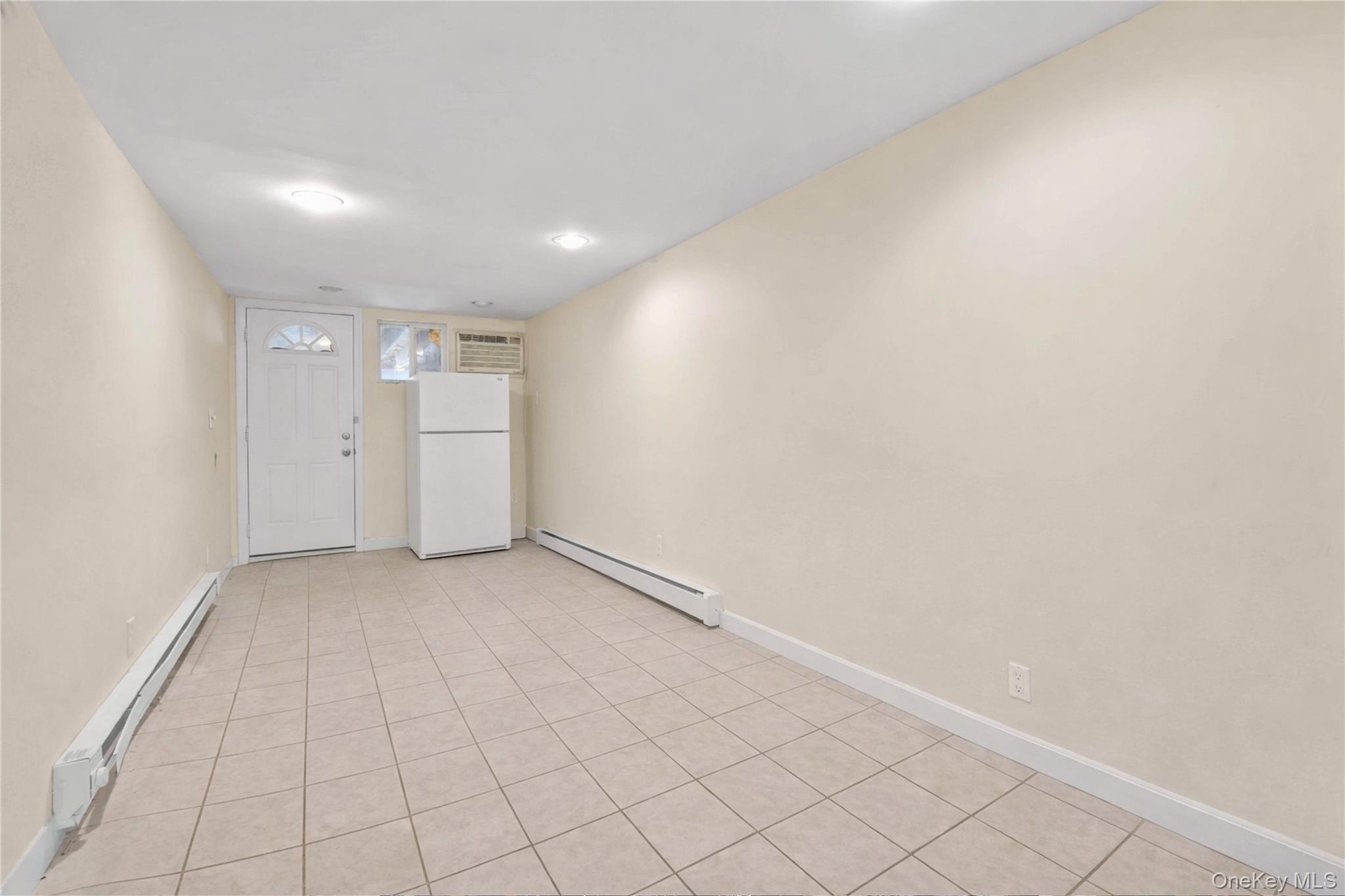 136-76 71st Road Queens, NY 11367 - Photo 25 of 31 a view of an empty room