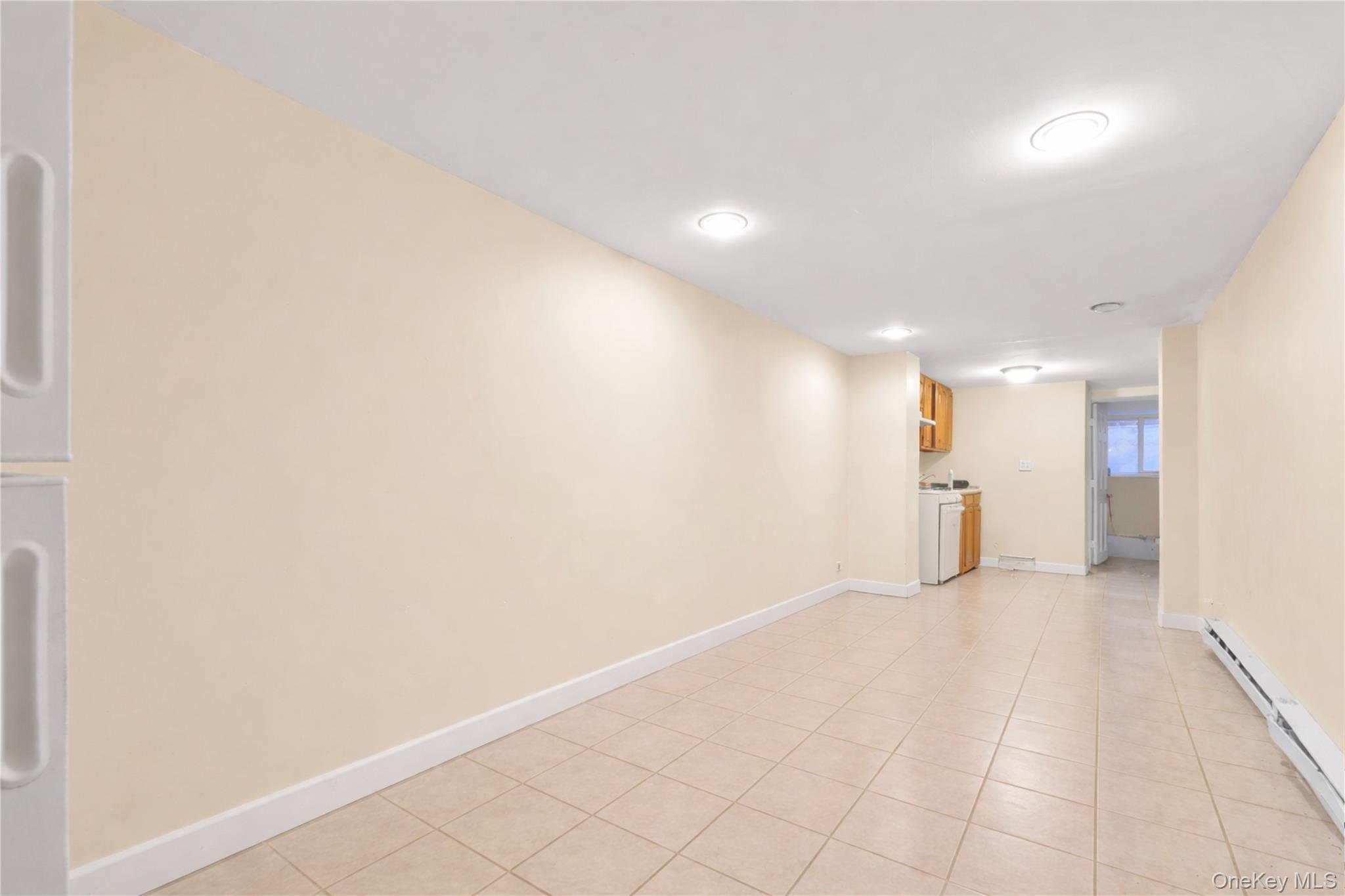 136-76 71st Road Queens, NY 11367 - Photo 27 of 31 a view of an empty room