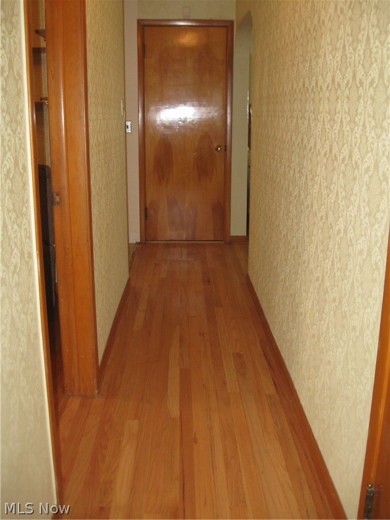 6154 State Road Parma, OH 44134 - Photo 20 of 35 Hall with hardwood flr. facing closet that leads to attic.