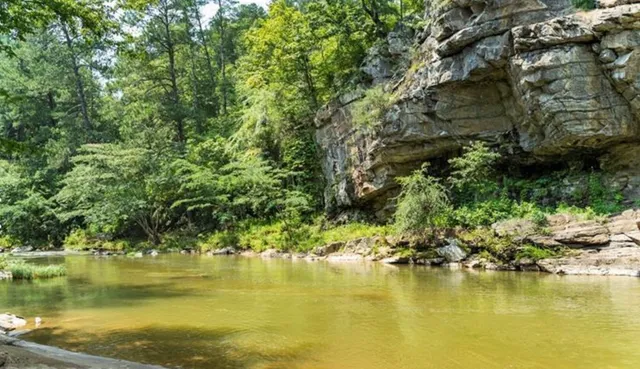 a view of water with water fall