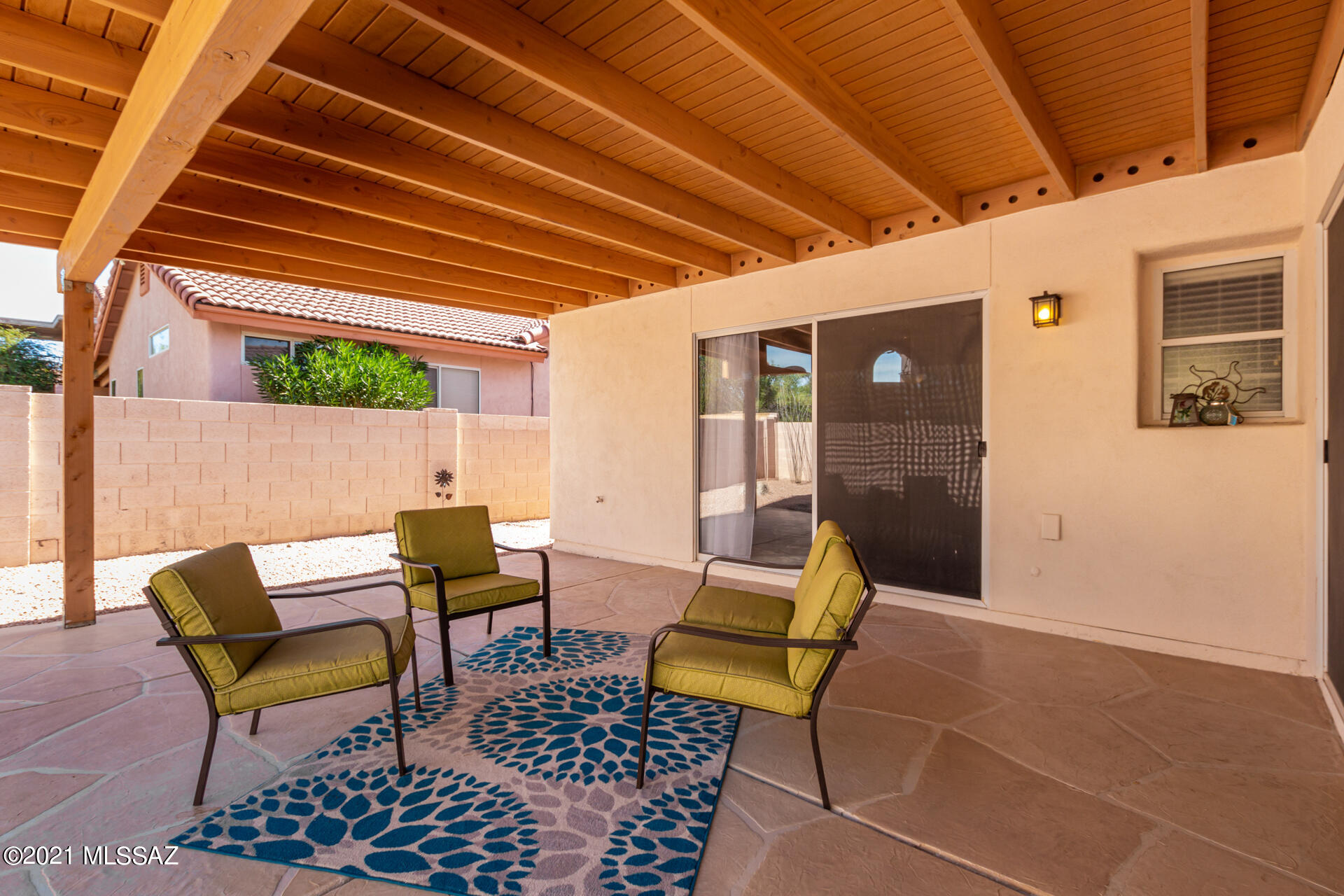 3034 West Sky Ranch Trail Tucson, AZ 85742 - Photo 25 of 27 a outdoor living space with furniture and a rug