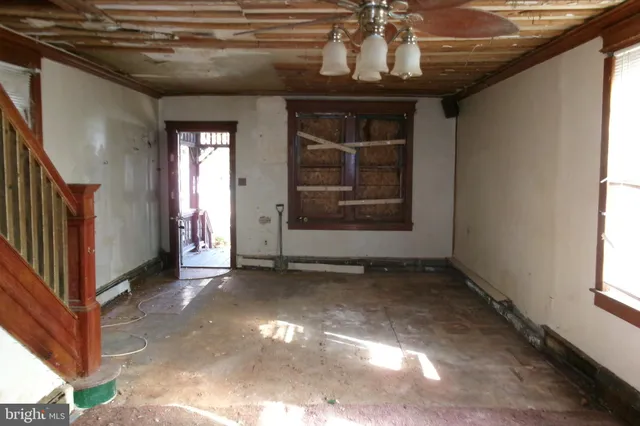 a view of empty room with windows