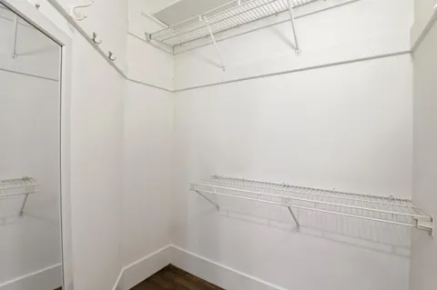a view of a room with racks on the wall