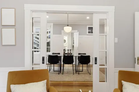 a view of living room with furniture and window