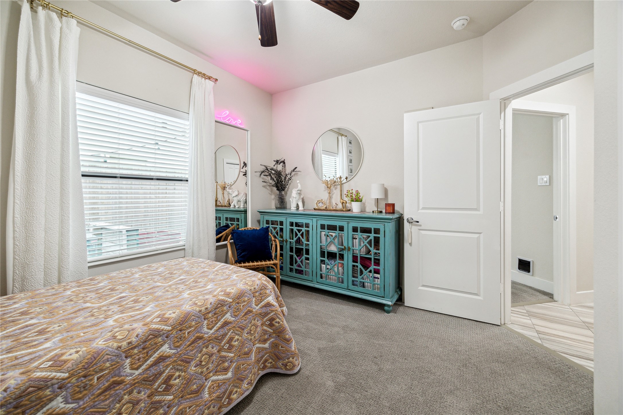 3939 Tulane Street Houston, TX 77018 - Photo 14 of 23 a bedroom with furniture and a window