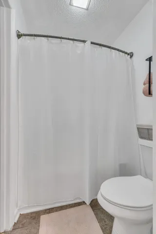 a view of balcony with chairs