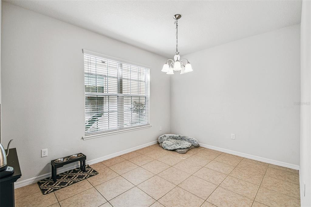 10624 Reams Road Windermere, FL 34786 - Photo 15 of 61 a view of an empty room with a window