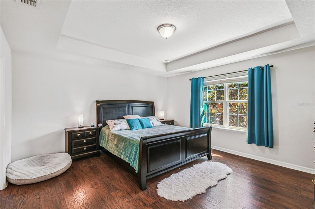 10624 Reams Road Windermere, FL 34786 - Photo 21 of 61 a bedroom with a bed and a window