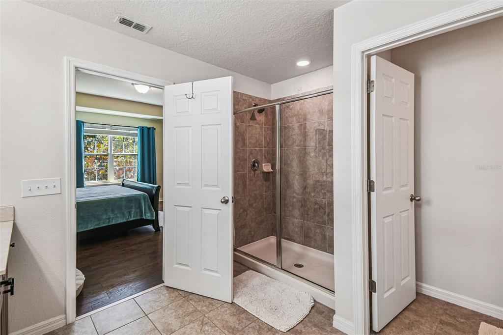 10624 Reams Road Windermere, FL 34786 - Photo 26 of 61 a bathroom with a shower and a sink