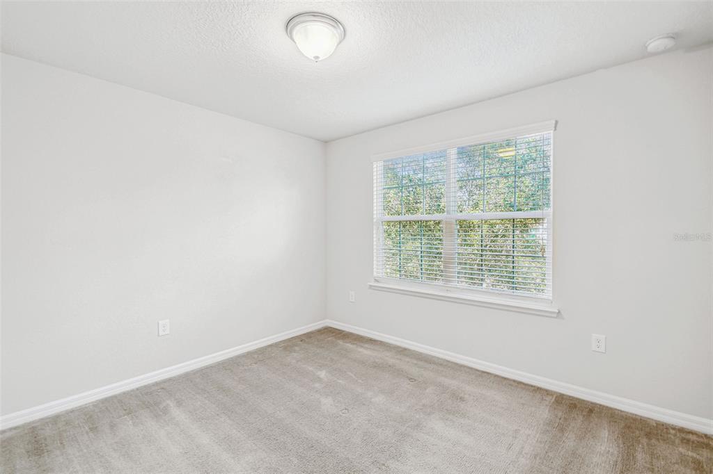 10624 Reams Road Windermere, FL 34786 - Photo 35 of 61 an empty room with a window