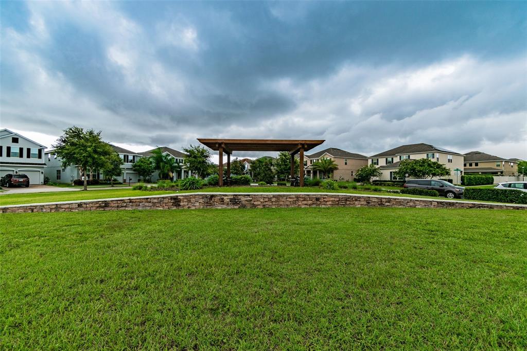 10624 Reams Road Windermere, FL 34786 - Photo 45 of 61 a view of a golf course with a lake
