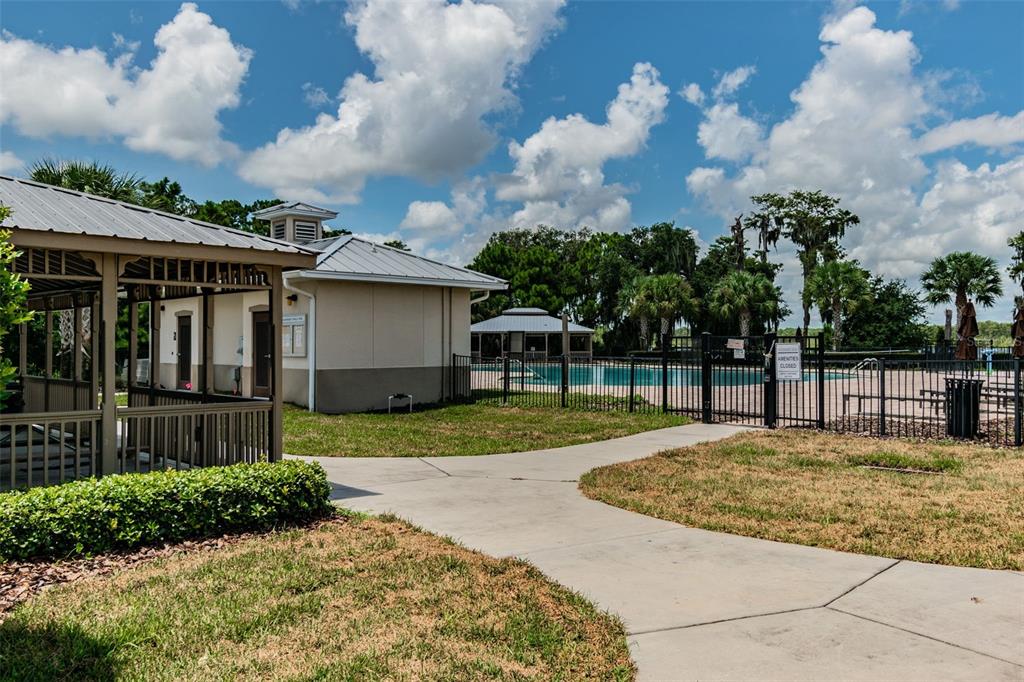 10624 Reams Road Windermere, FL 34786 - Photo 53 of 61 a house view with swimming pool in front of it