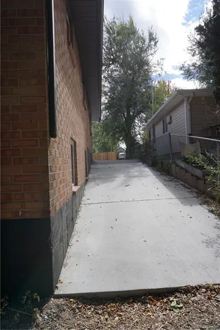 a view of a backyard space