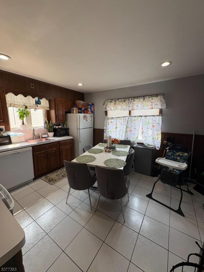 128 Grove Street, Unit 2 Bloomfield, NJ 07003 - Photo 14 of 33 a kitchen with a sink and cabinets