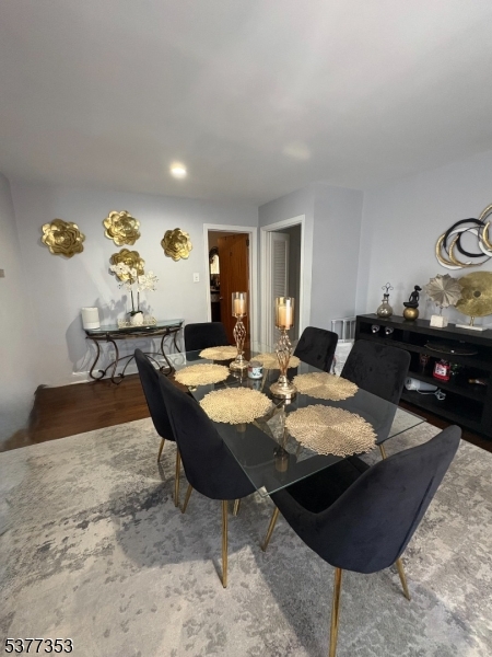 128 Grove Street, Unit 2 Bloomfield, NJ 07003 - Photo 10 of 33 a view of a dining table and chairs in a room