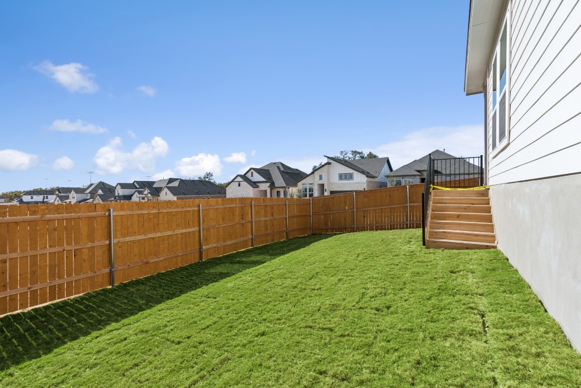 247 Grayson Elm Pass Dripping Springs, TX 78620 - Photo 27 of 39 a view of a backyard