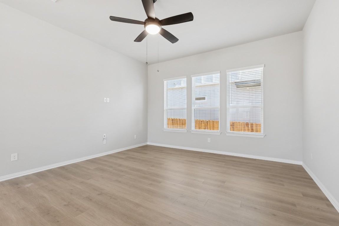 247 Grayson Elm Pass Dripping Springs, TX 78620 - Photo 8 of 39 a view of an empty room with a window