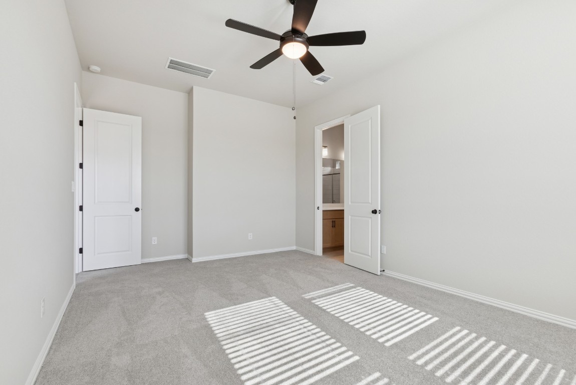 247 Grayson Elm Pass Dripping Springs, TX 78620 - Photo 10 of 39 a view of an empty room