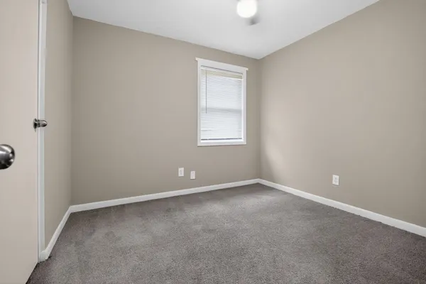 an empty room with window