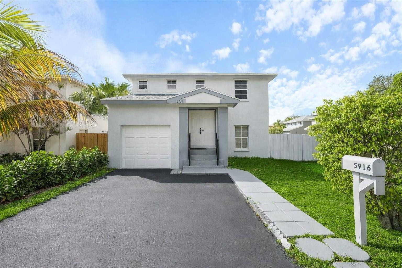5916 Woodland Point Place Tamarac, FL 33319 - Photo 1 of 26 Photo 1