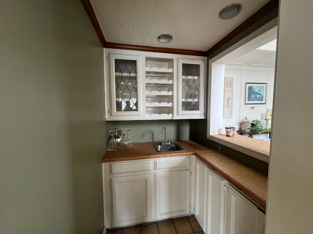 16702 Mandeville Court Spring, TX 77379 - Photo 12 of 15 a kitchen with a sink and cabinets