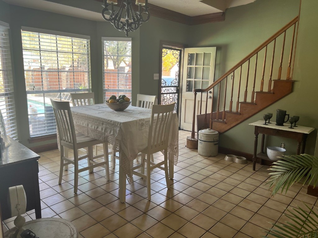 16702 Mandeville Court Spring, TX 77379 - Photo 6 of 15 a view of a dining room with furniture window and wooden floor