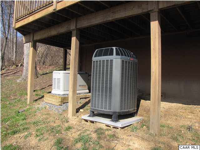 460 Farmview Road Stanardsville, VA 22973 - Photo 13 of 25 This super efficient heat pump serves ONLY the sun room (separate unit for the rest of the house). And to its left is a new whole house generator.