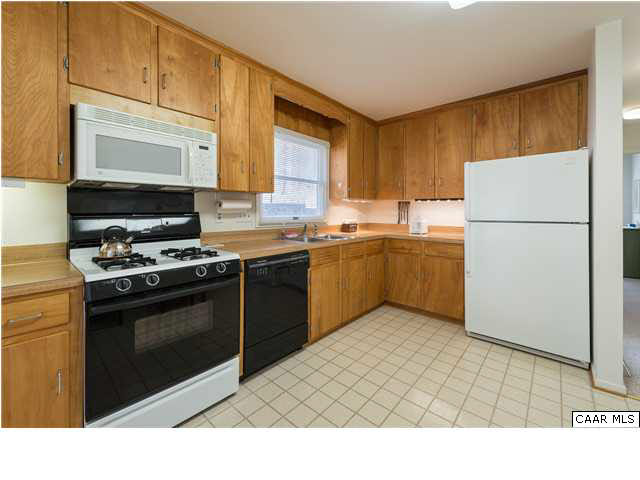460 Farmview Road Stanardsville, VA 22973 - Photo 7 of 25 Modest kitchen, well situated in the center of the home.