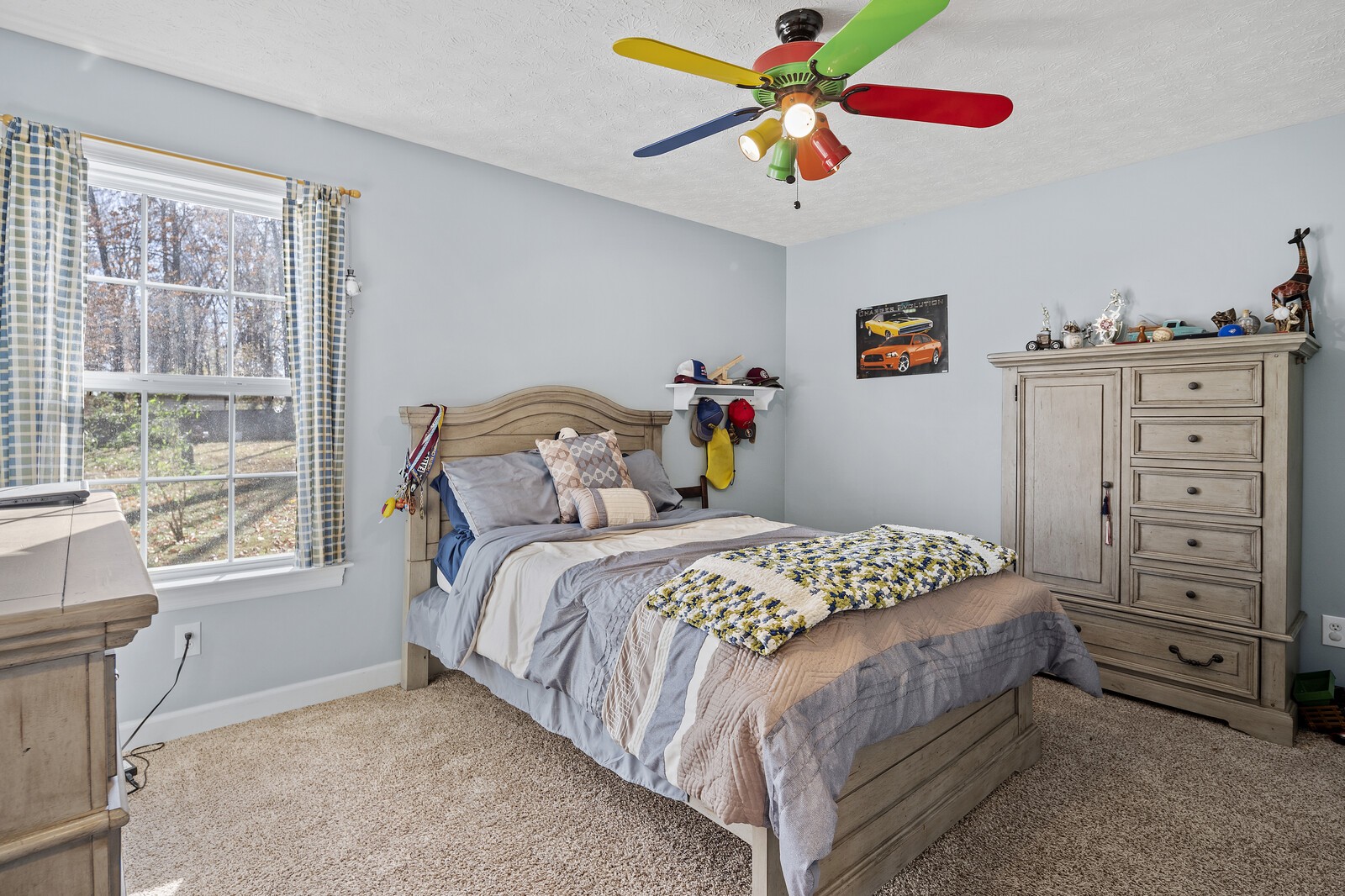 8035 Cedar Grove Road Cross Plains, TN 37049 - Photo 12 of 40 a bedroom with a bed and a chandelier