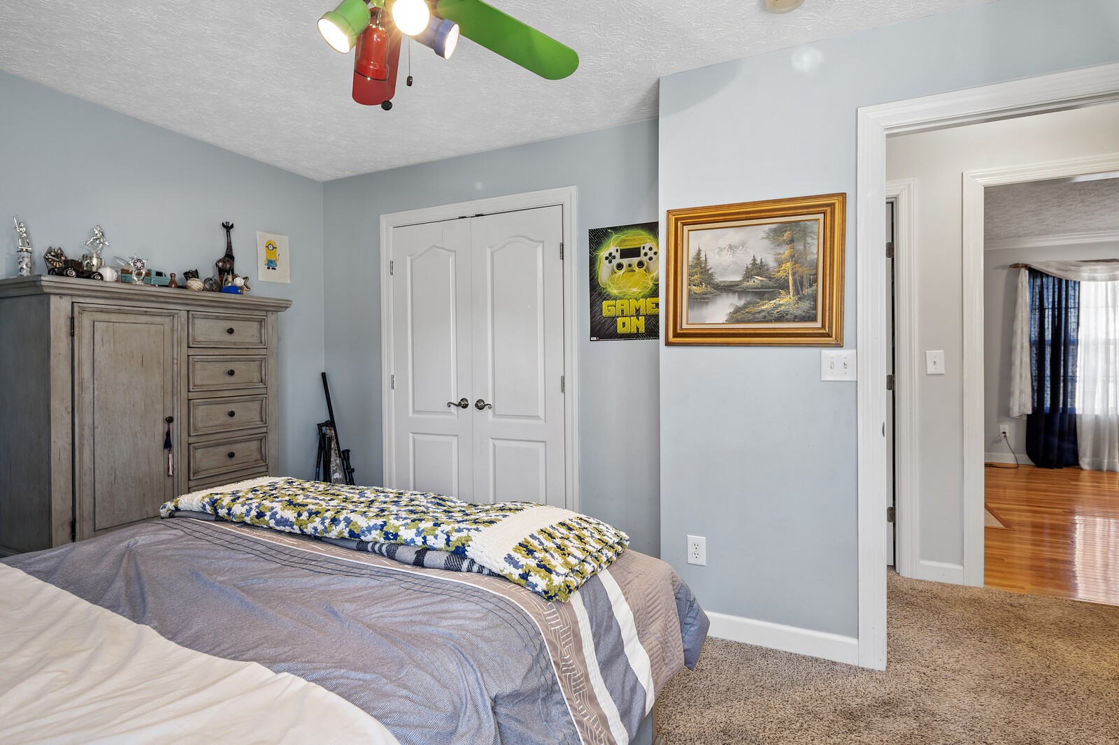 8035 Cedar Grove Road Cross Plains, TN 37049 - Photo 13 of 40 a bedroom with a bed and a chandelier