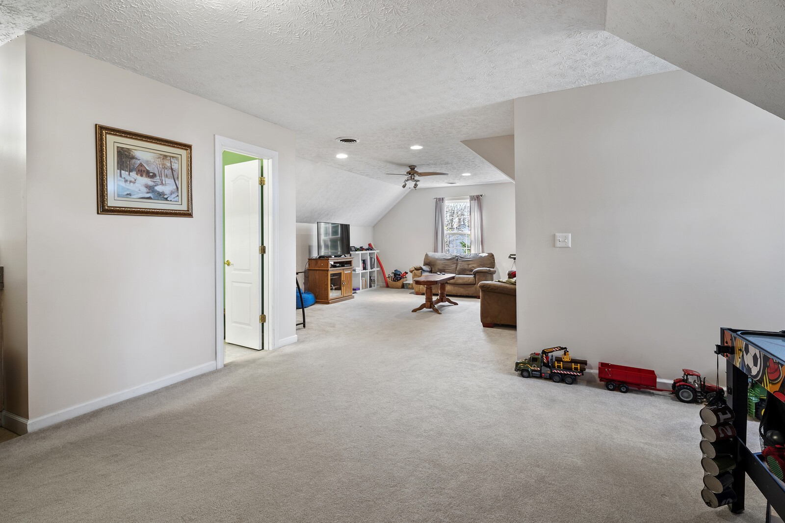 8035 Cedar Grove Road Cross Plains, TN 37049 - Photo 23 of 40 a room with gym equipment and a view of living room