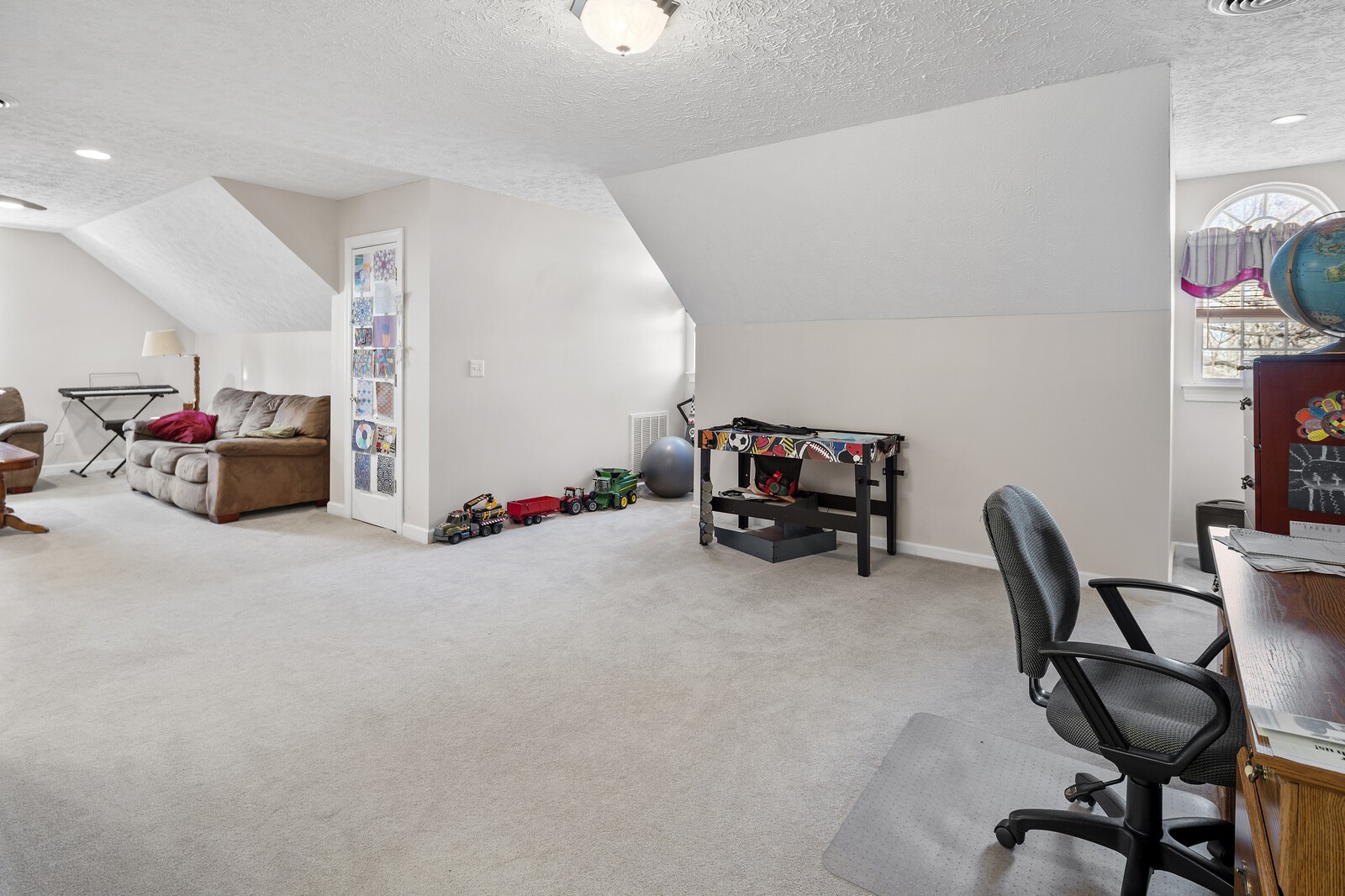 8035 Cedar Grove Road Cross Plains, TN 37049 - Photo 27 of 40 a view of a livingroom with furniture and a chair