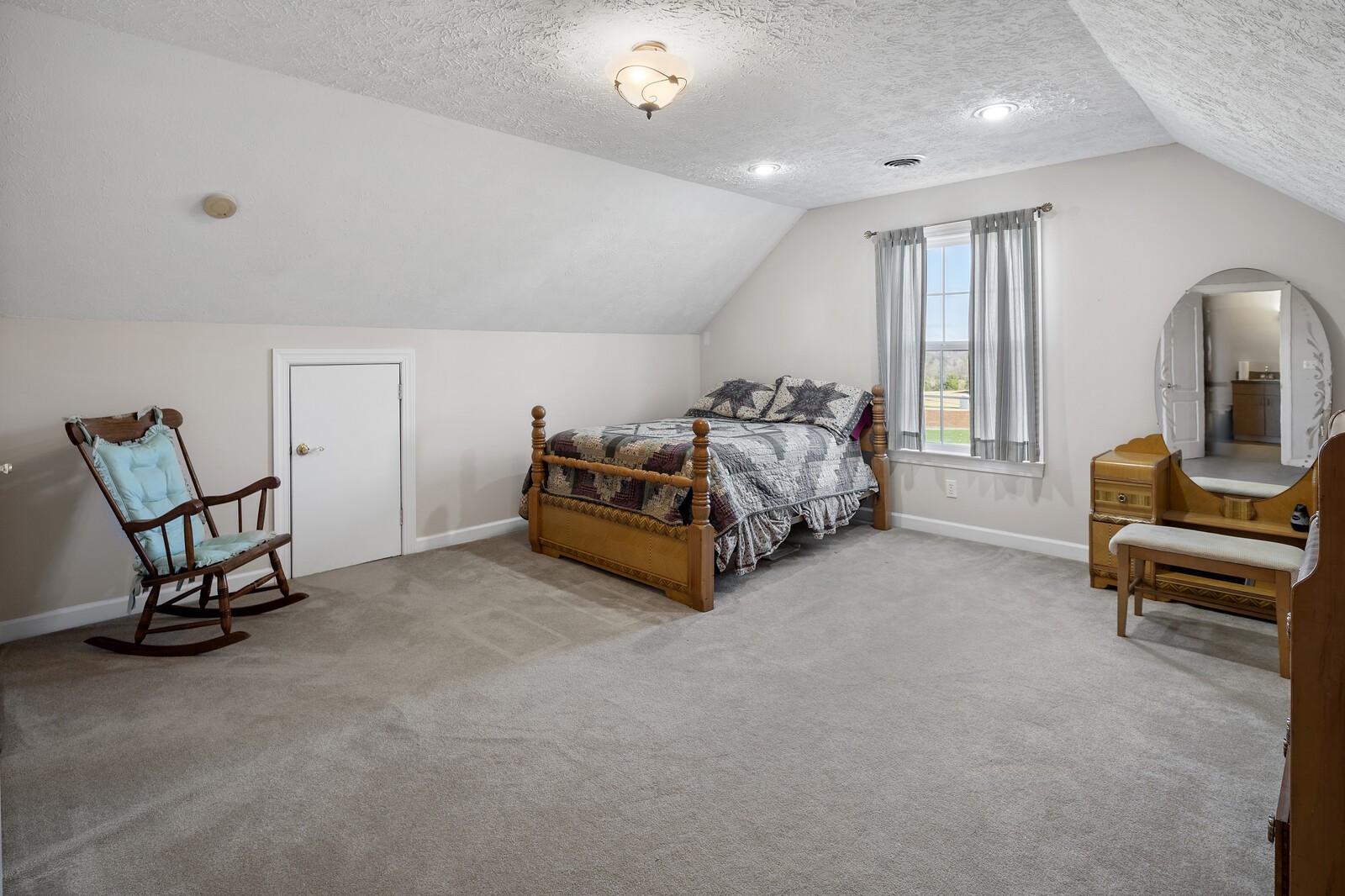 8035 Cedar Grove Road Cross Plains, TN 37049 - Photo 28 of 40 a bed room with a bed and a chair