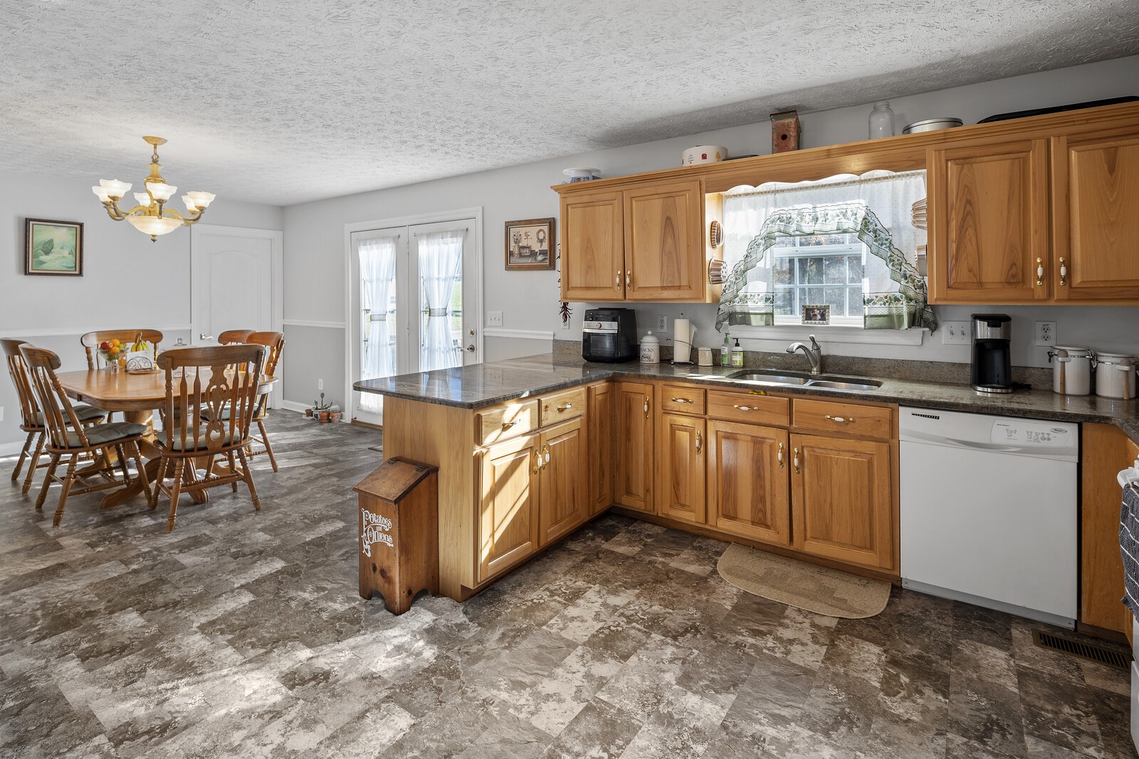 8035 Cedar Grove Road Cross Plains, TN 37049 - Photo 32 of 40 a kitchen with sink cabinets and window