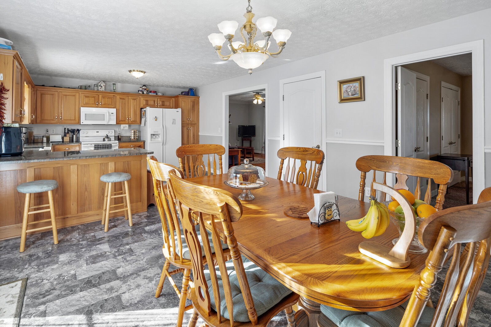 8035 Cedar Grove Road Cross Plains, TN 37049 - Photo 38 of 40 a view of a dining room with furniture and a chandelier