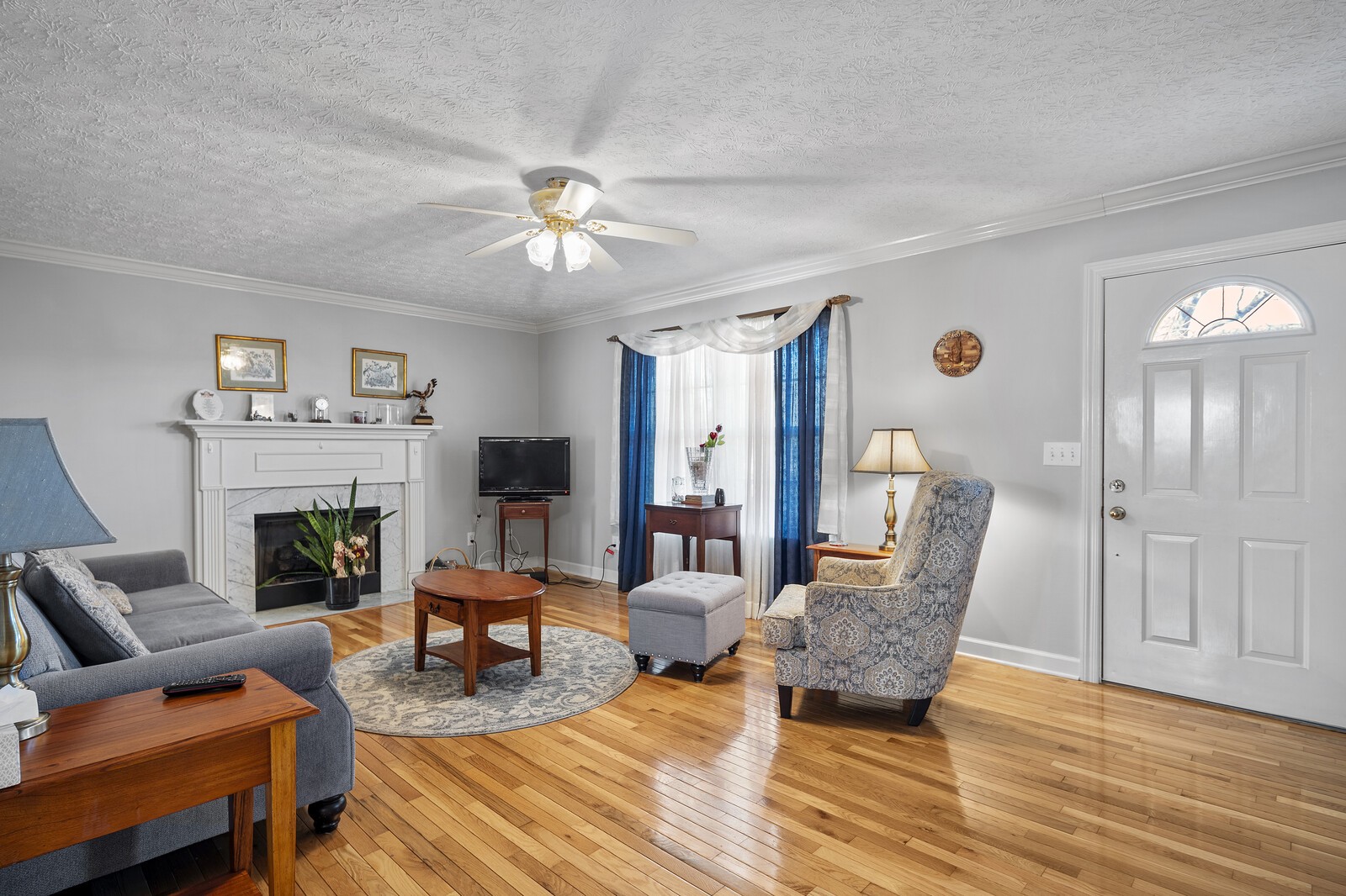 8035 Cedar Grove Road Cross Plains, TN 37049 - Photo 7 of 40 a living room with furniture and a fireplace