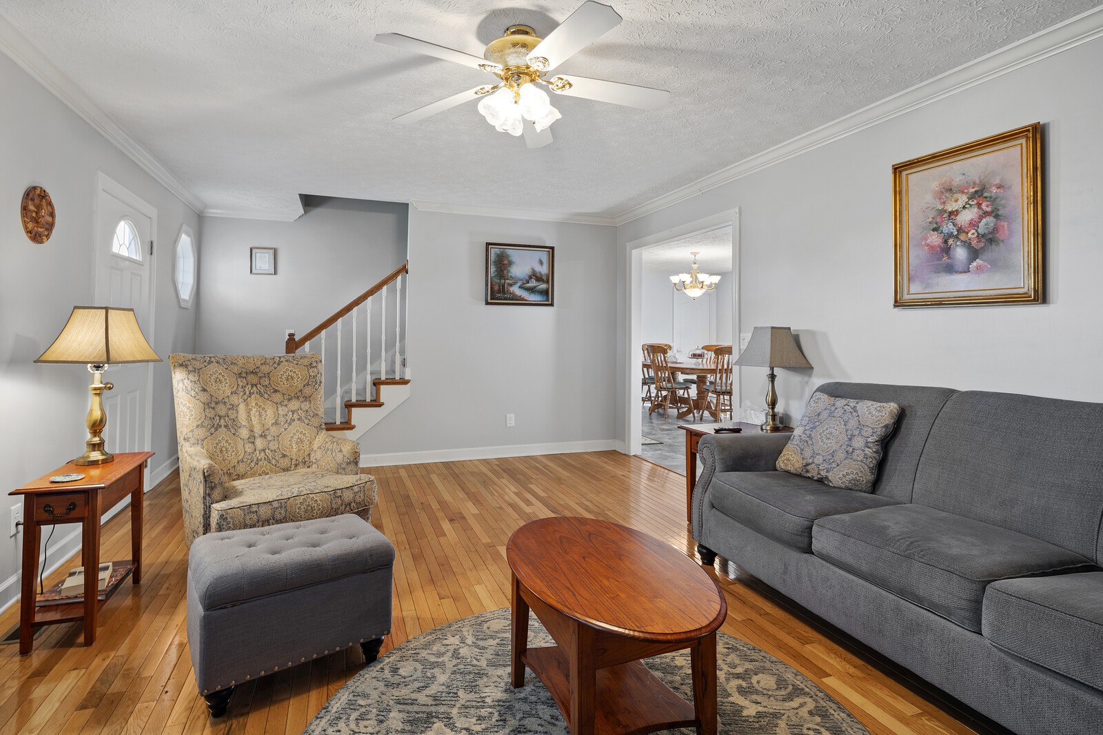 8035 Cedar Grove Road Cross Plains, TN 37049 - Photo 10 of 40 a living room with furniture and a chandelier