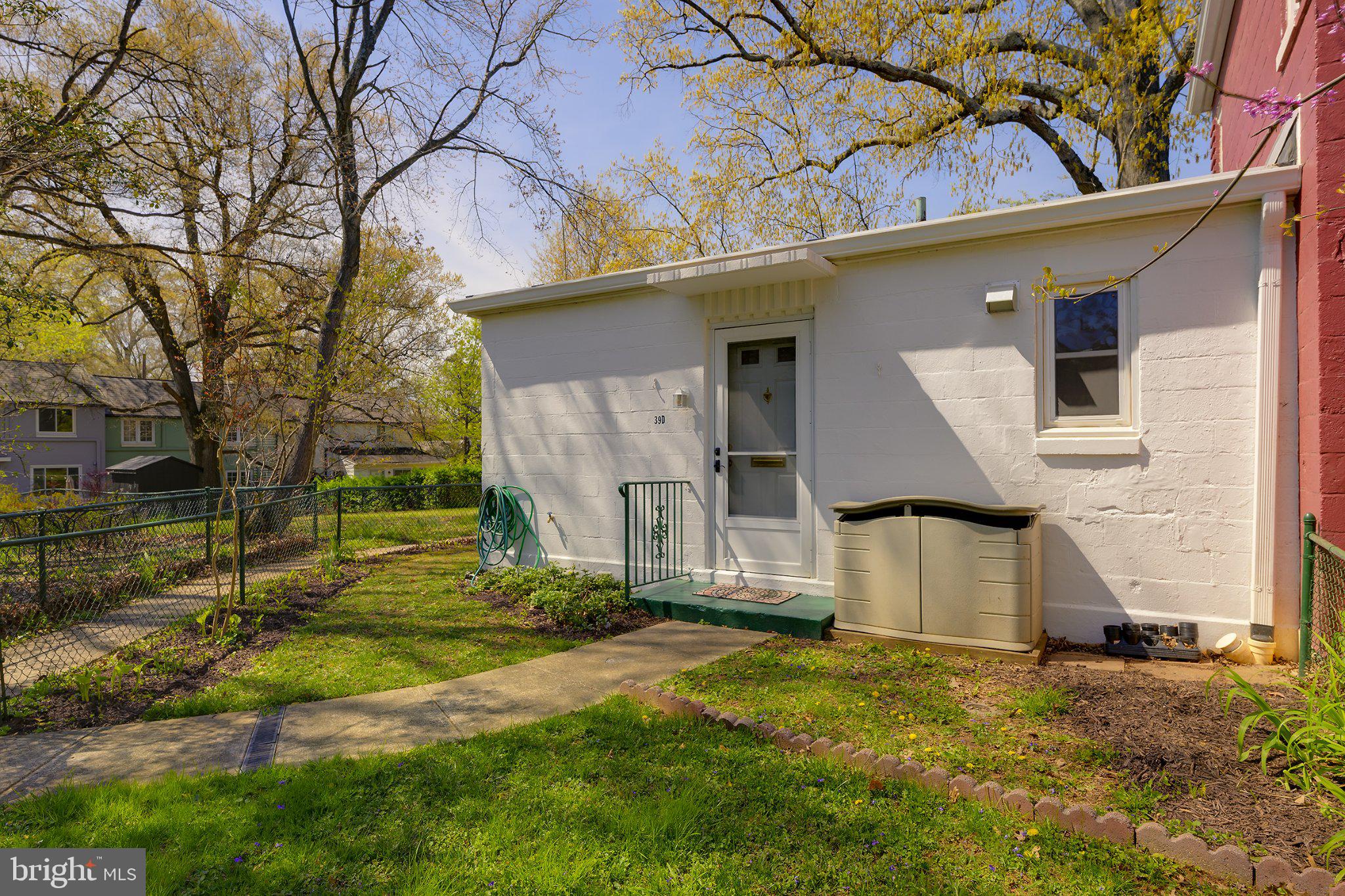 39 Ridge Road Greenbelt, MD 20770 - Photo 3 of 19 a view of a house with a yard