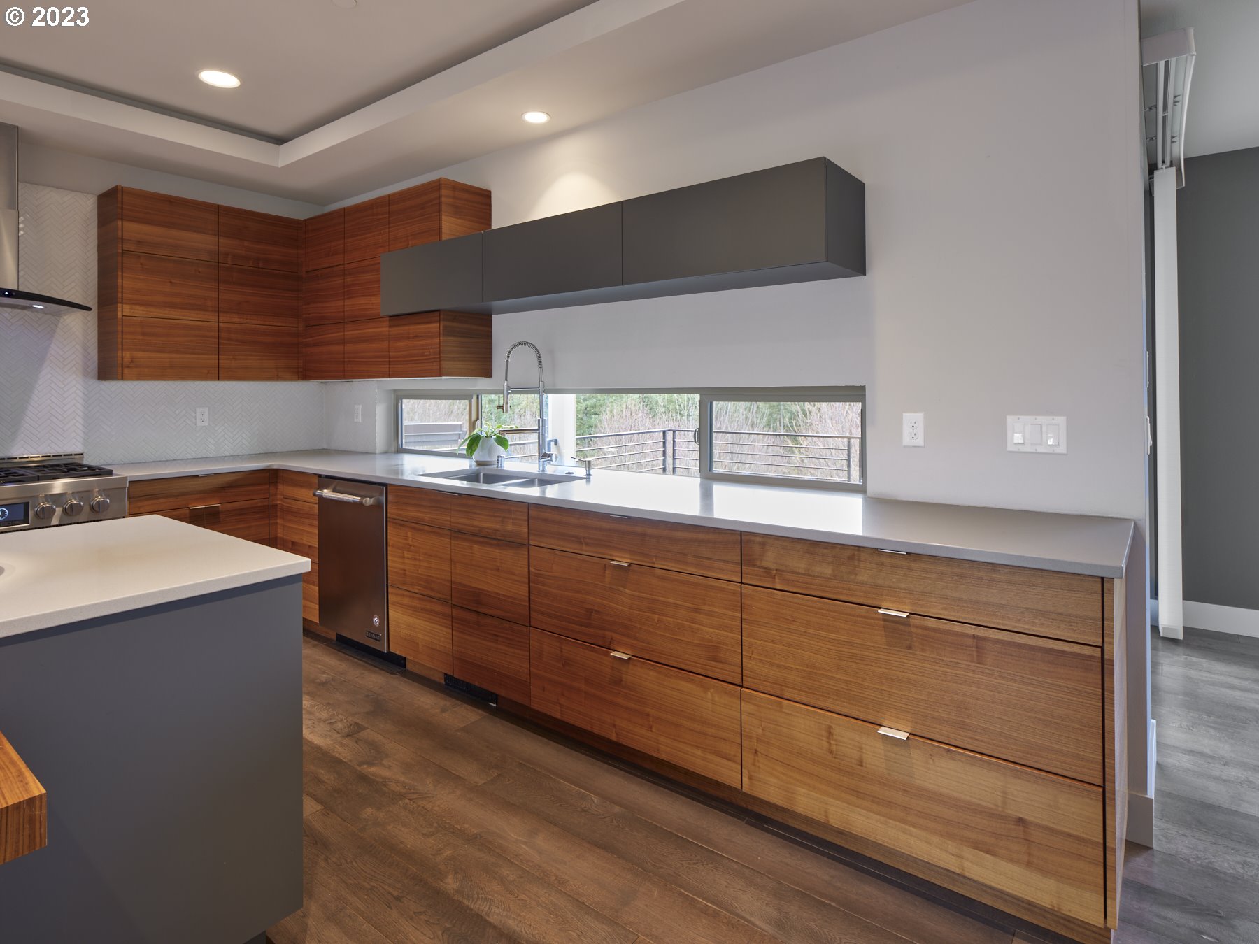 4633 North Adams Street Camas, WA 98607 - Photo 16 of 40 a kitchen with wooden cabinets and sink