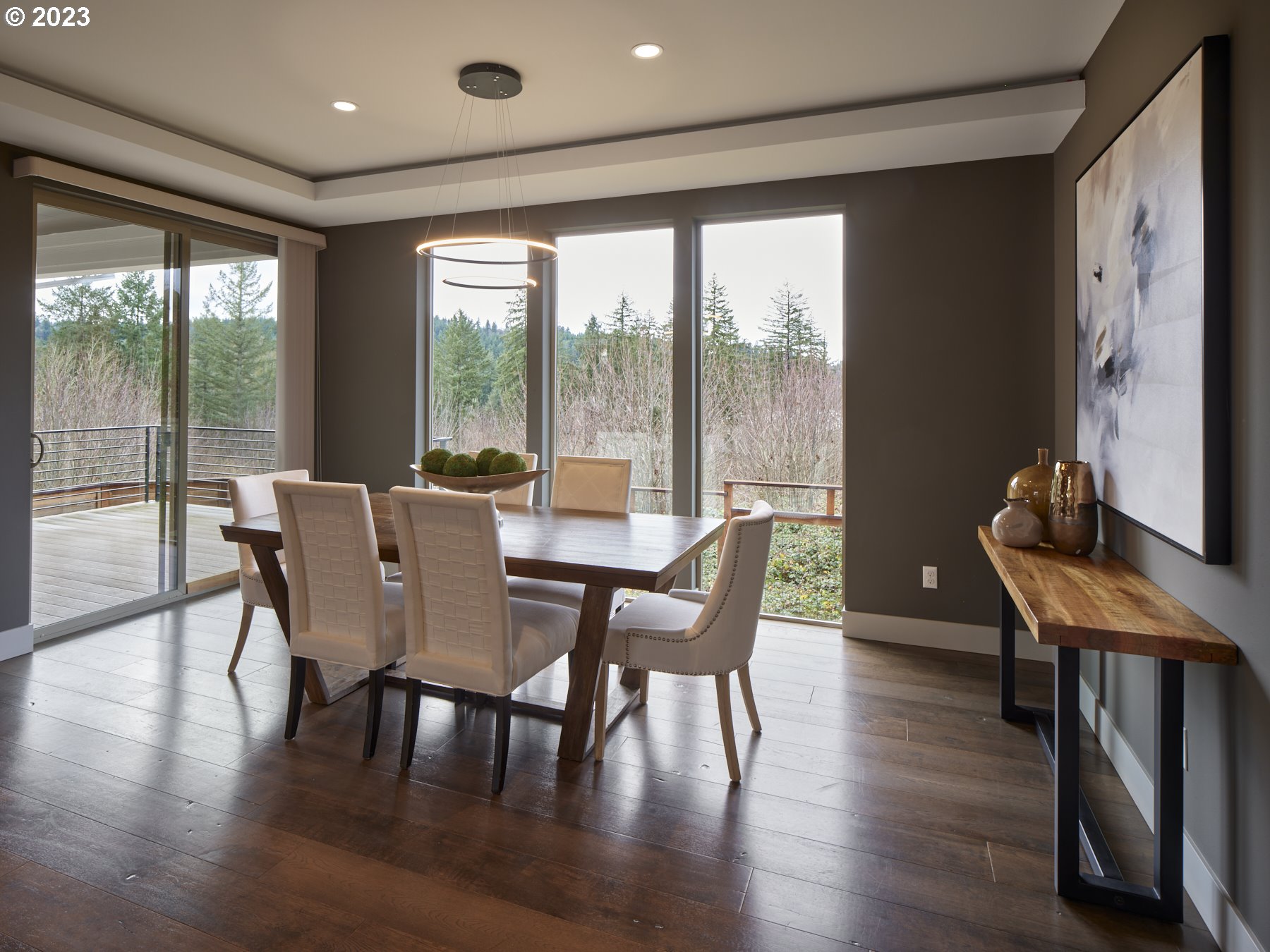 4633 North Adams Street Camas, WA 98607 - Photo 18 of 40 a view of a dining room with furniture window and wooden floor