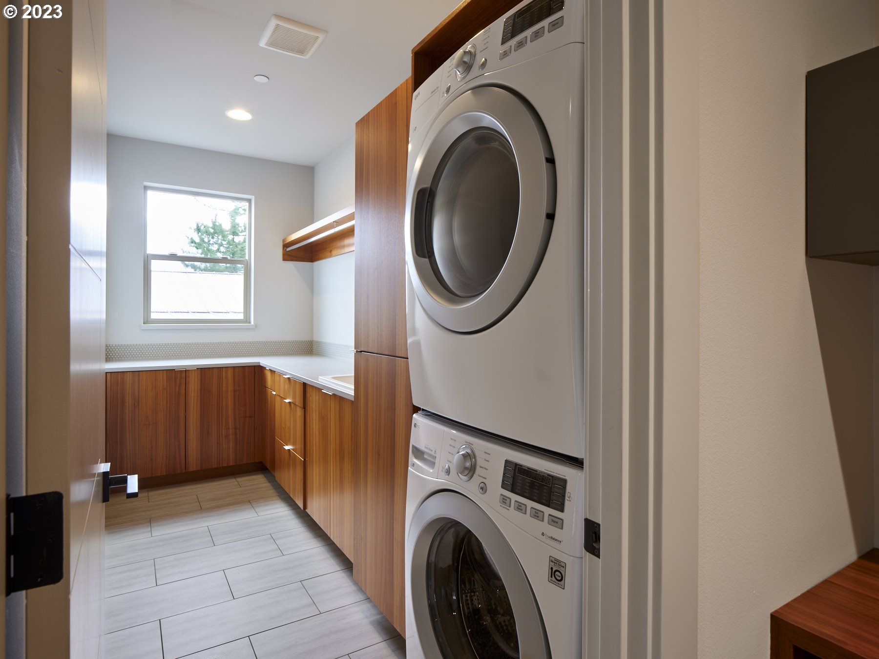 4633 North Adams Street Camas, WA 98607 - Photo 27 of 40 a view of a storage & utility room with dryer and washer